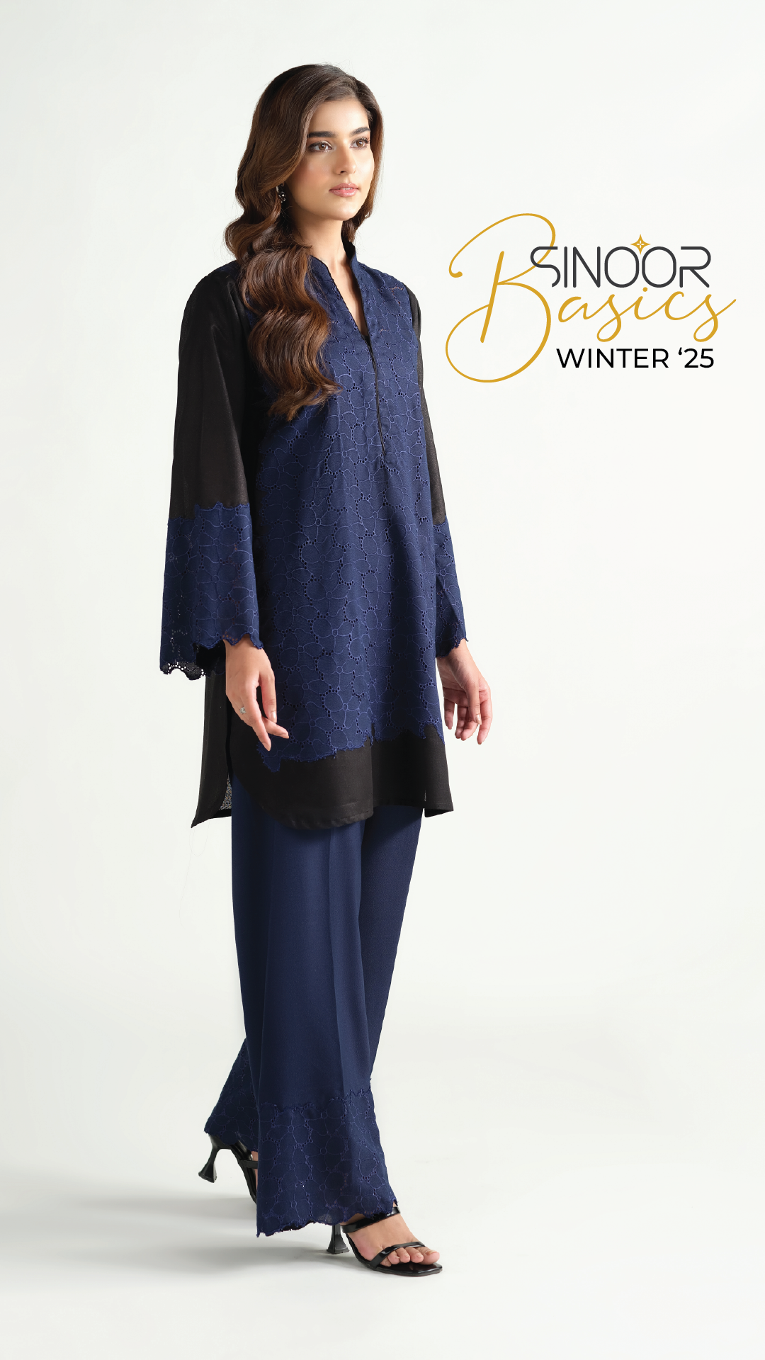 Sinoor's 'Aylin' navy blue and black embroidered pret suit from the Winter Basic Collection. Elegant ready-to-wear kurta and trousers for women.
