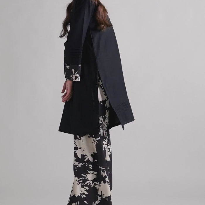 The 'Roha' by Sinoor: an elegant black ready-to-wear kurta and printed trouser set from our Winter '25 Basic Collection. Perfect for everyday style.