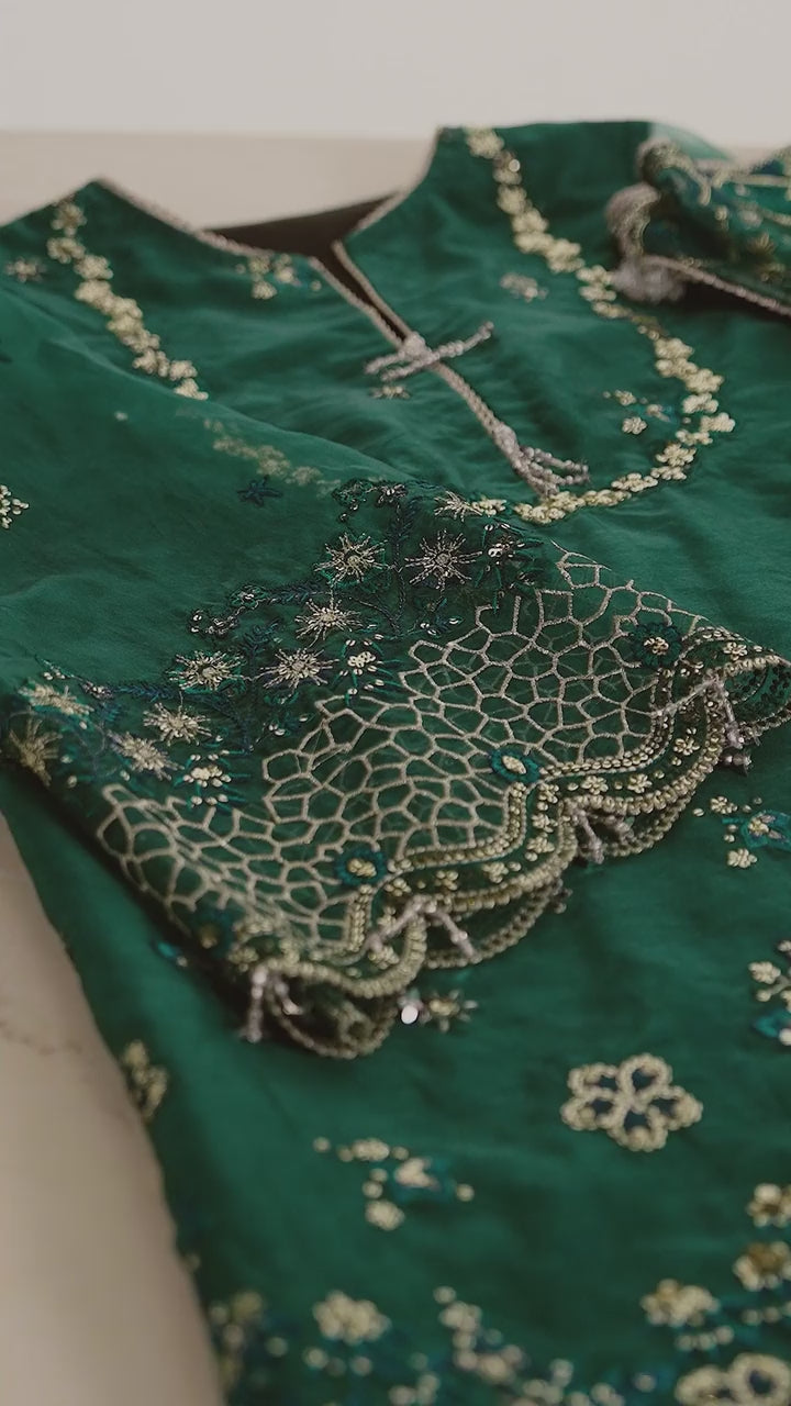 Fabric close-up highlighting intricate embroidery and luxurious finish of 'Vasl' from the Pehla Khat collection.
