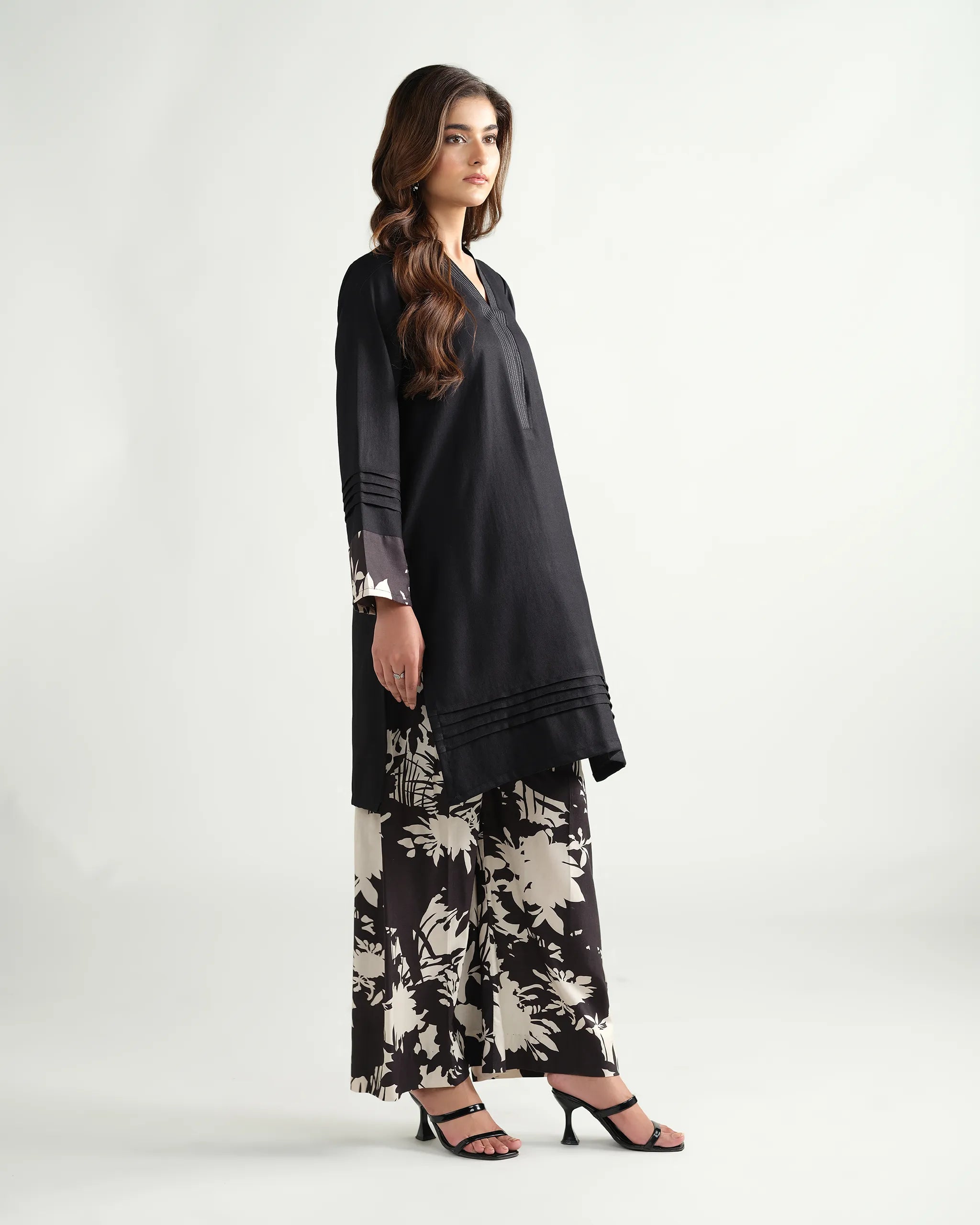 The 'Roha' by Sinoor: an elegant black ready-to-wear kurta and printed trouser set from our Winter '25 Basic Collection. Perfect for everyday style.