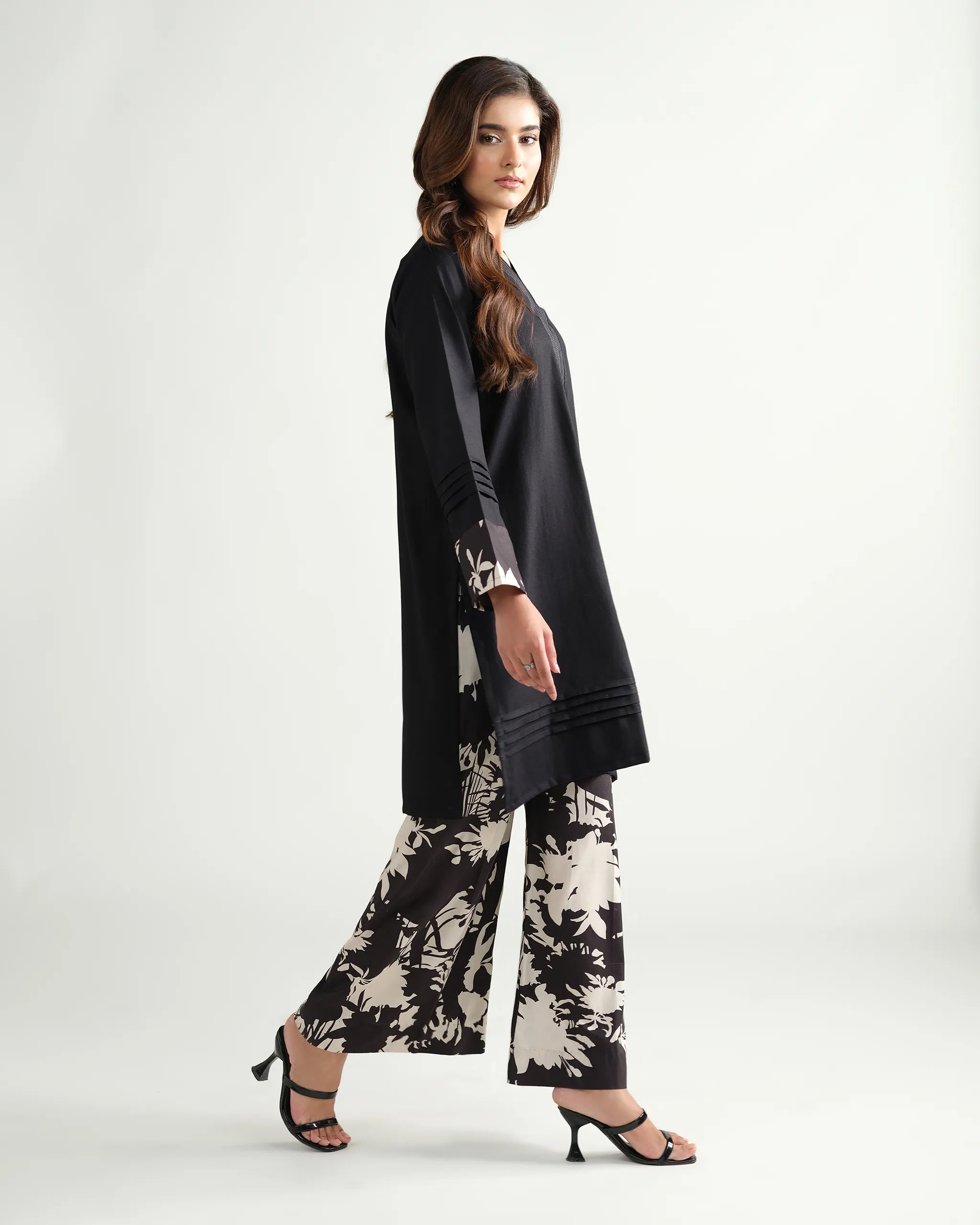 The 'Roha' by Sinoor: an elegant black ready-to-wear kurta and printed trouser set from our Winter '25 Basic Collection. Perfect for everyday style.