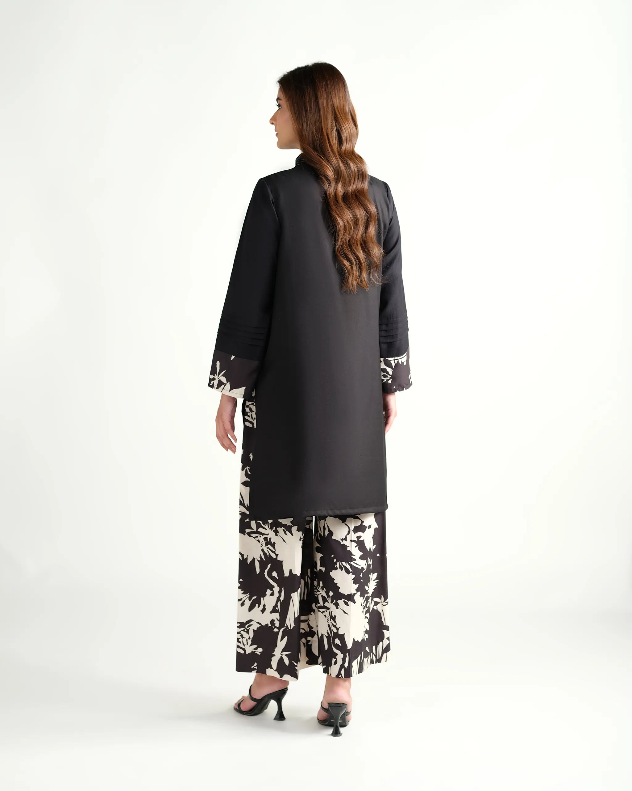 The 'Roha' by Sinoor: an elegant black ready-to-wear kurta and printed trouser set from our Winter '25 Basic Collection. Perfect for everyday style.